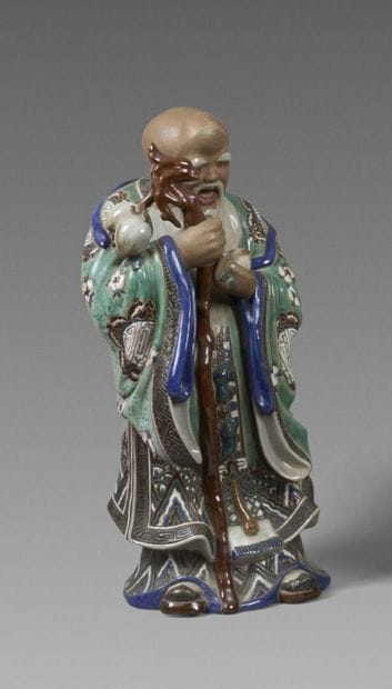 MAY CAI. 
A partially polychrome-glazed stoneware...