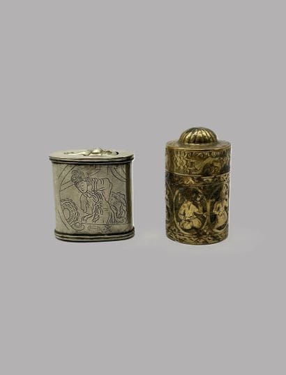 Set of two opium boxes.
- A cylindrical brass...