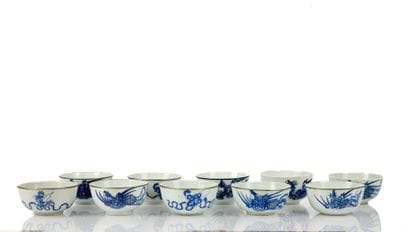 Set of 10 blue-and-white porcelain bowls,...