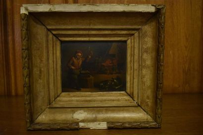 Ecole française dans le goût de Teniers
Homme...