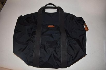 Sac en toile noire Longchamp et deux trousses...