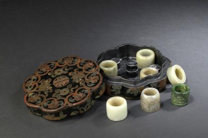 Seven archer's rings in celadon jade and...