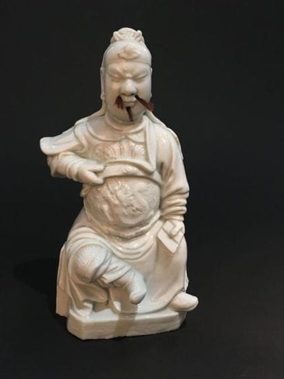 Statuette of a dignitary in white Chinese...