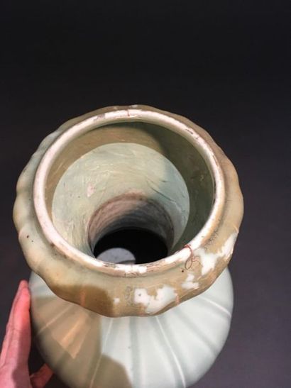 Celadon porcelain vase
China, 19th century
The...