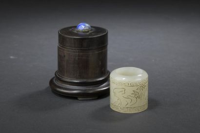 Celadon jade archery ring and its wooden...