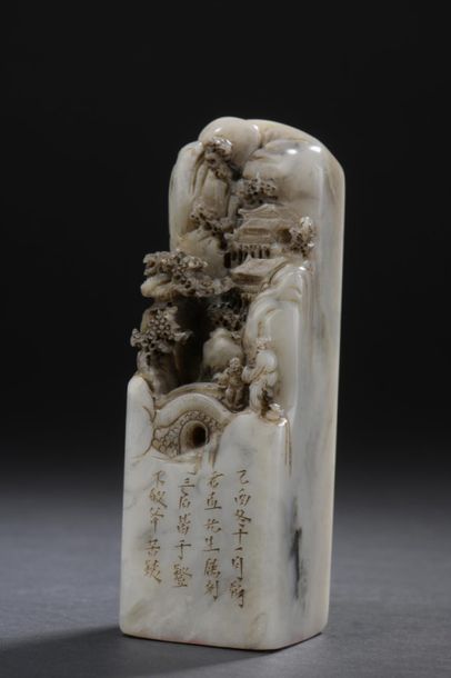 Grey stone stamp
China
The upper part of...