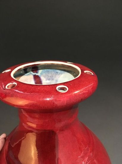 Porcelain vase of ox-blood
China, 20th century
The...