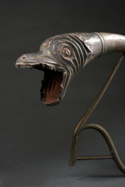 Element of French horn in repoussé copper...