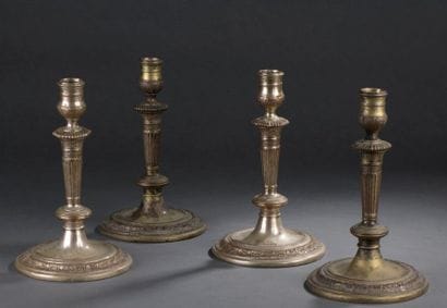 A suite of four Louis XIV
period silver plated...