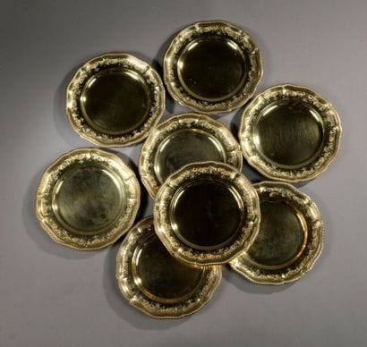 ODIOT
Eighteen gilt plates, Minerva punch,...