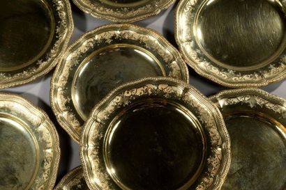ODIOT
Eighteen gilt plates, Minerva punch,...