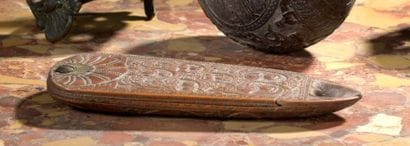 Carved wooden tobacco grater dated 1731 with...