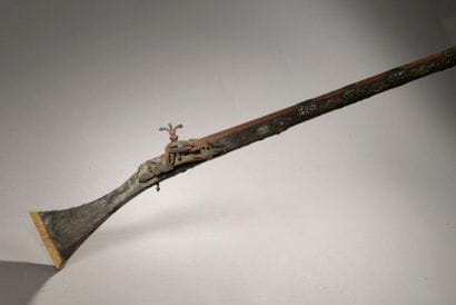 Long Moroccan flintlock rifle, known as a...