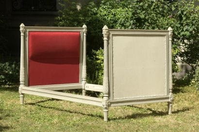 Moulded and carved wooden bed stamped C....