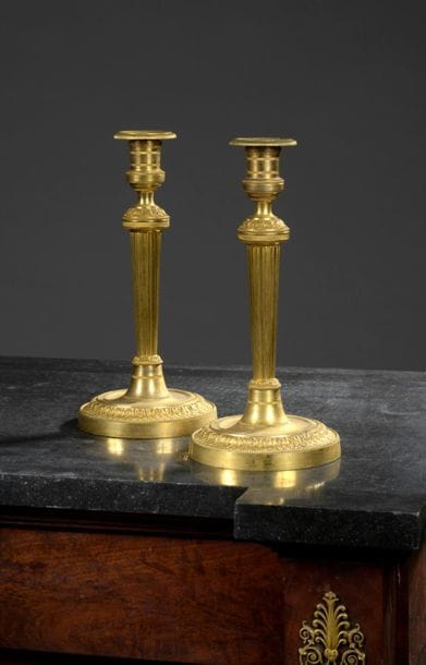 Pair of chased and gilt bronze torches with...