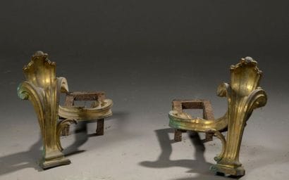 Pair of chased and gilded bronze andirons...