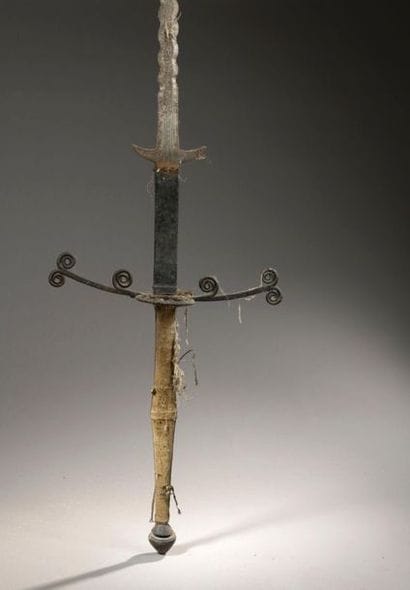 Two-handed sword. Velvet-covered rocket....