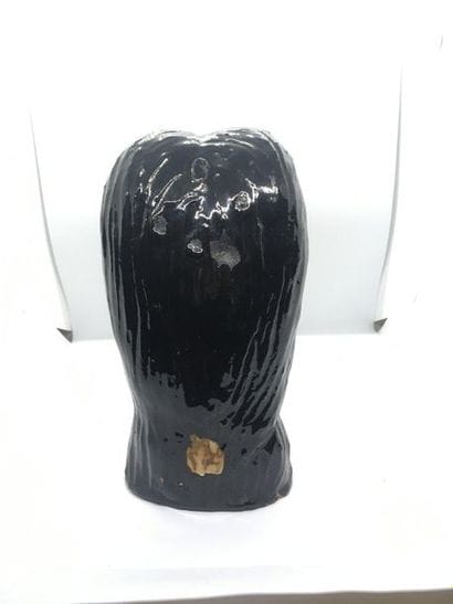 Glazed terracotta woman's head, circa 1950
H....