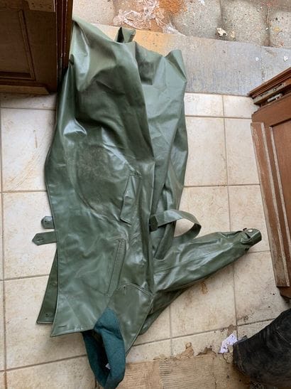 Coat, in green oilcloth. In the state