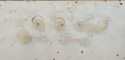 MANNETTE including :

A pair of decanters,...