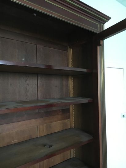 Mahogany and mahogany veneer showcase in...