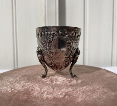 Set of two napkin rings and an egg cup.

Silver...