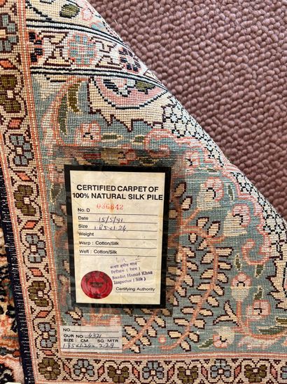 IRAN

Cotton and silk carpet with vegetal...