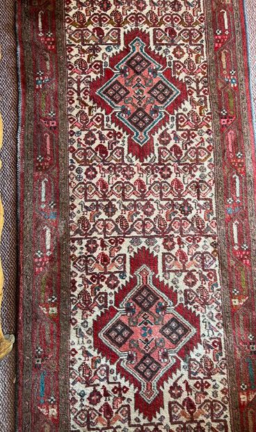 Woolen gallery carpet with polychrome decoration...