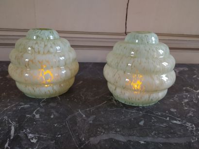 Pair of glass globes, c. 1920

H. 13 cm