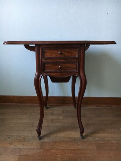Table travailleuse en acajou et placage d'acajou,...