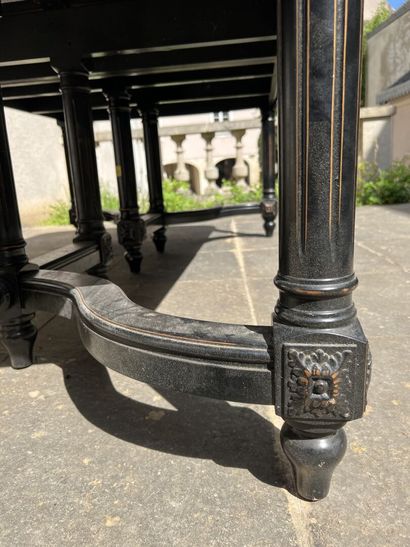 Large blackened carved wood extension table,...