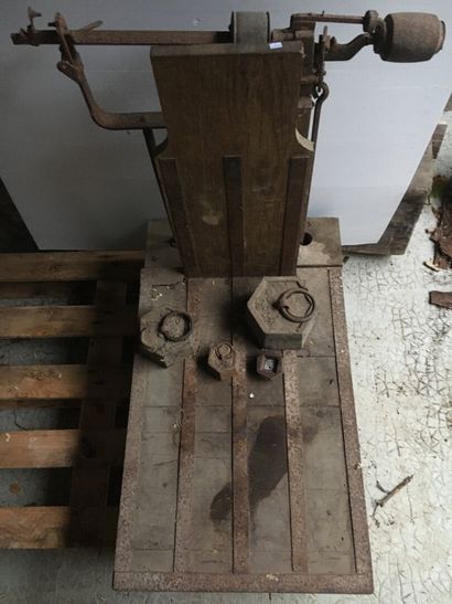 Oak grain scale, c. 1950

Three cast iron...