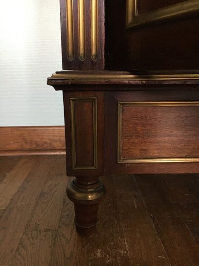 Mahogany and mahogany veneer showcase in...