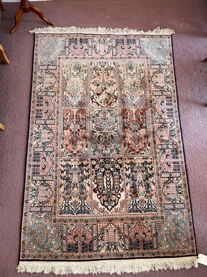IRAN

Cotton and silk carpet with vegetal...