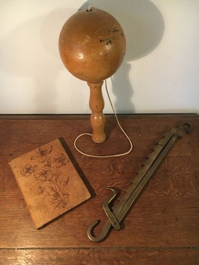 Lot including a wooden bilboquet, XIXth century

A...