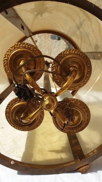 Lanterne à quatre lumières, style Louis XVI.

H.55,...