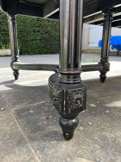 Large blackened carved wood extension table,...
