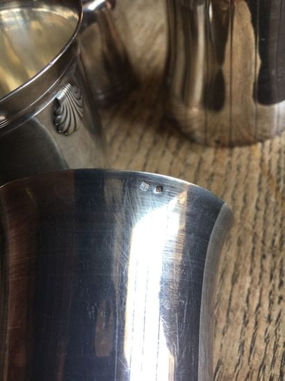 Lot of five silver goblets.

Three silver...