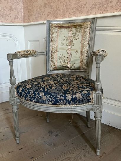 Molded and carved wood armchair from the...