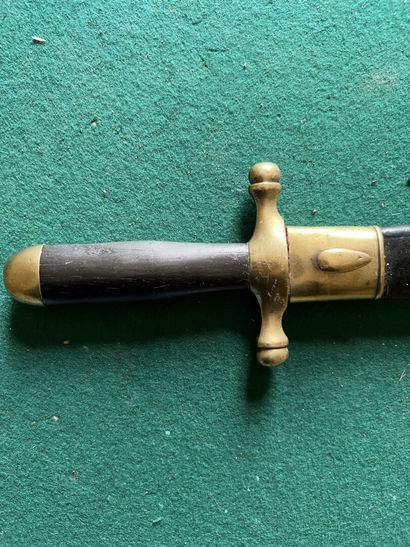 Dagger of venery. Ebony handle. Brass mounting....