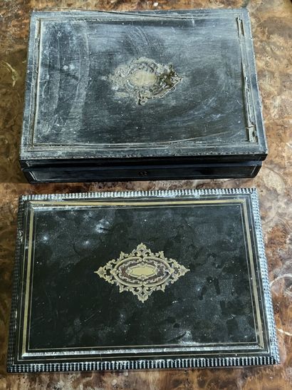 Two blackened wood boxes and nets of Napoleon...