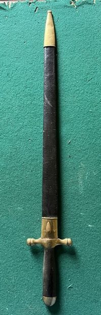 Dagger of venery. Ebony handle. Brass mounting....