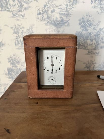 Travelling clock in brass around 1850

In...