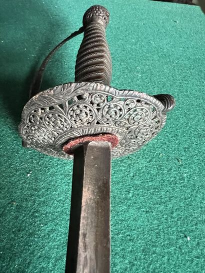 Court sword. Fuse entirely filigree of iron...