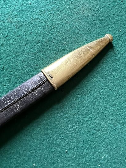 Dagger of venery. Ebony handle. Brass mounting....