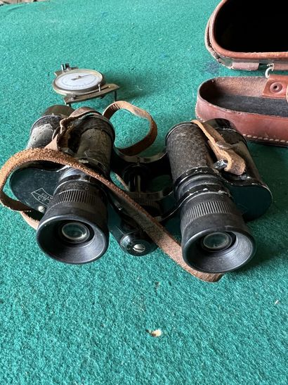 Pair of binoculars, 8 x 25. With brown leather...