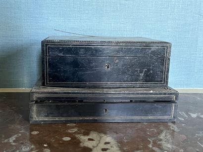 Two blackened wood boxes and nets of Napoleon...