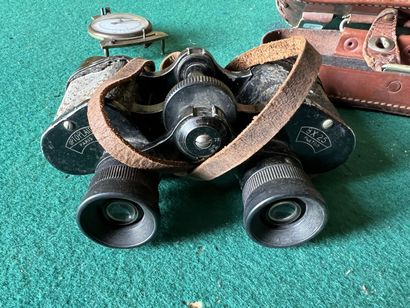 Pair of binoculars, 8 x 25. With brown leather...