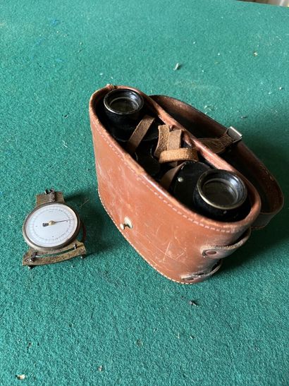 Pair of binoculars, 8 x 25. With brown leather...