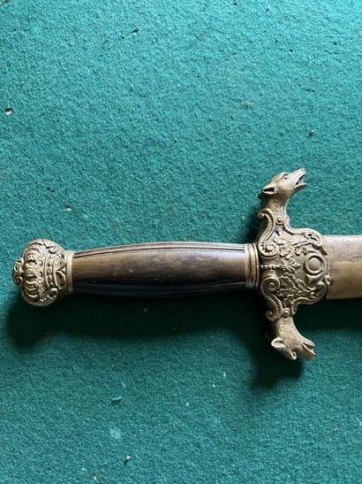 Wolfman's dagger. Handle in horn. Brass mounting,...